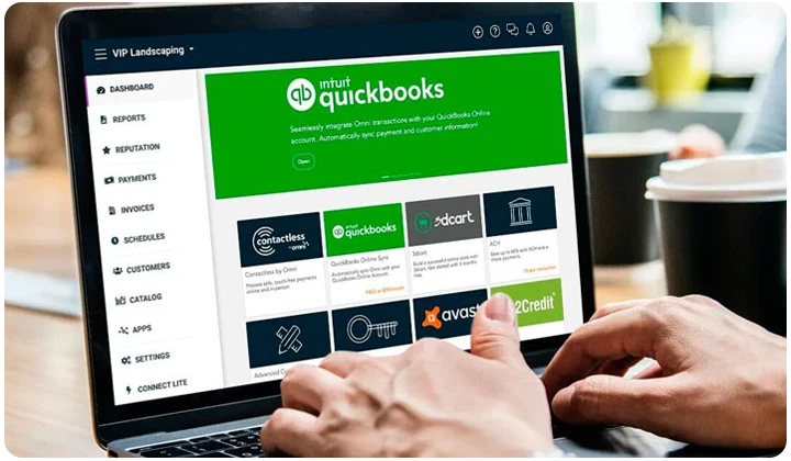 Person reviewing their financial report on a laptop